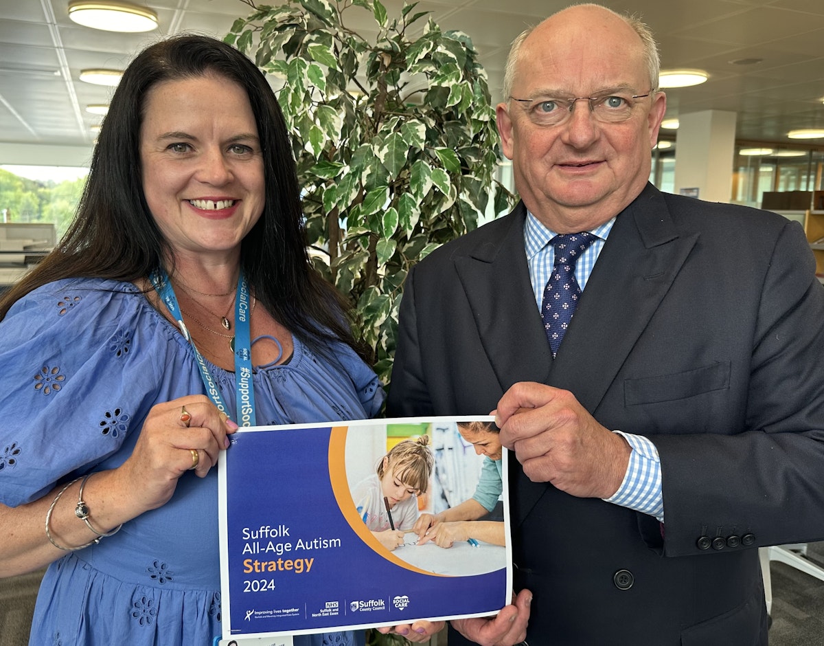 Cllr. Beccy Hopfensperger and Cllr. Andrew Reid holding a copy of the new strategy